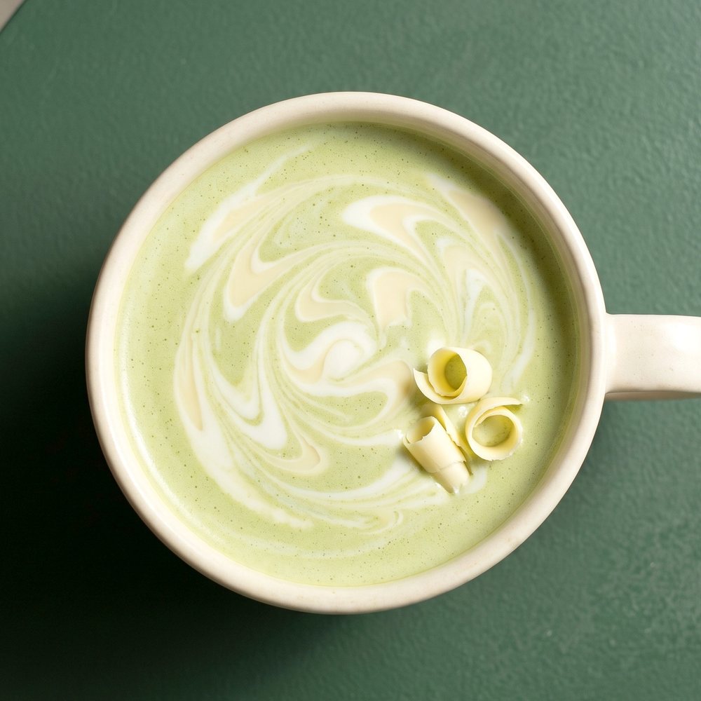 White chocolate matcha latte with chocolate curls