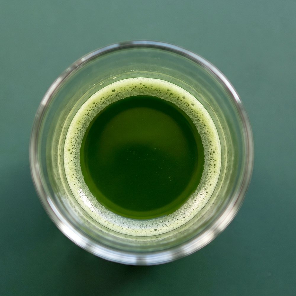 Concentrated matcha shot in a clear glass
