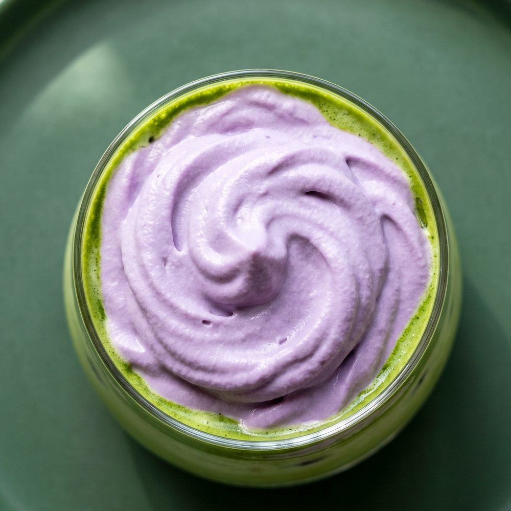 Ube whip — purple whipped cream cap over matcha
